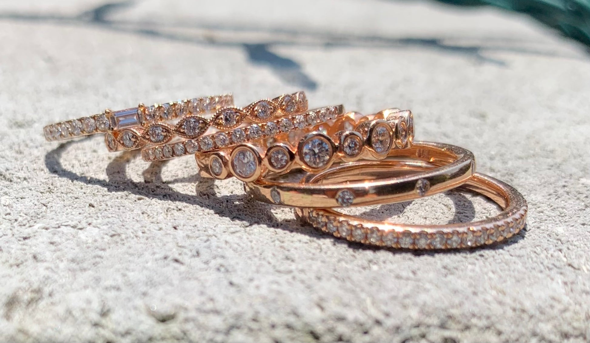 Stack of 14k rose gold & diamond bands